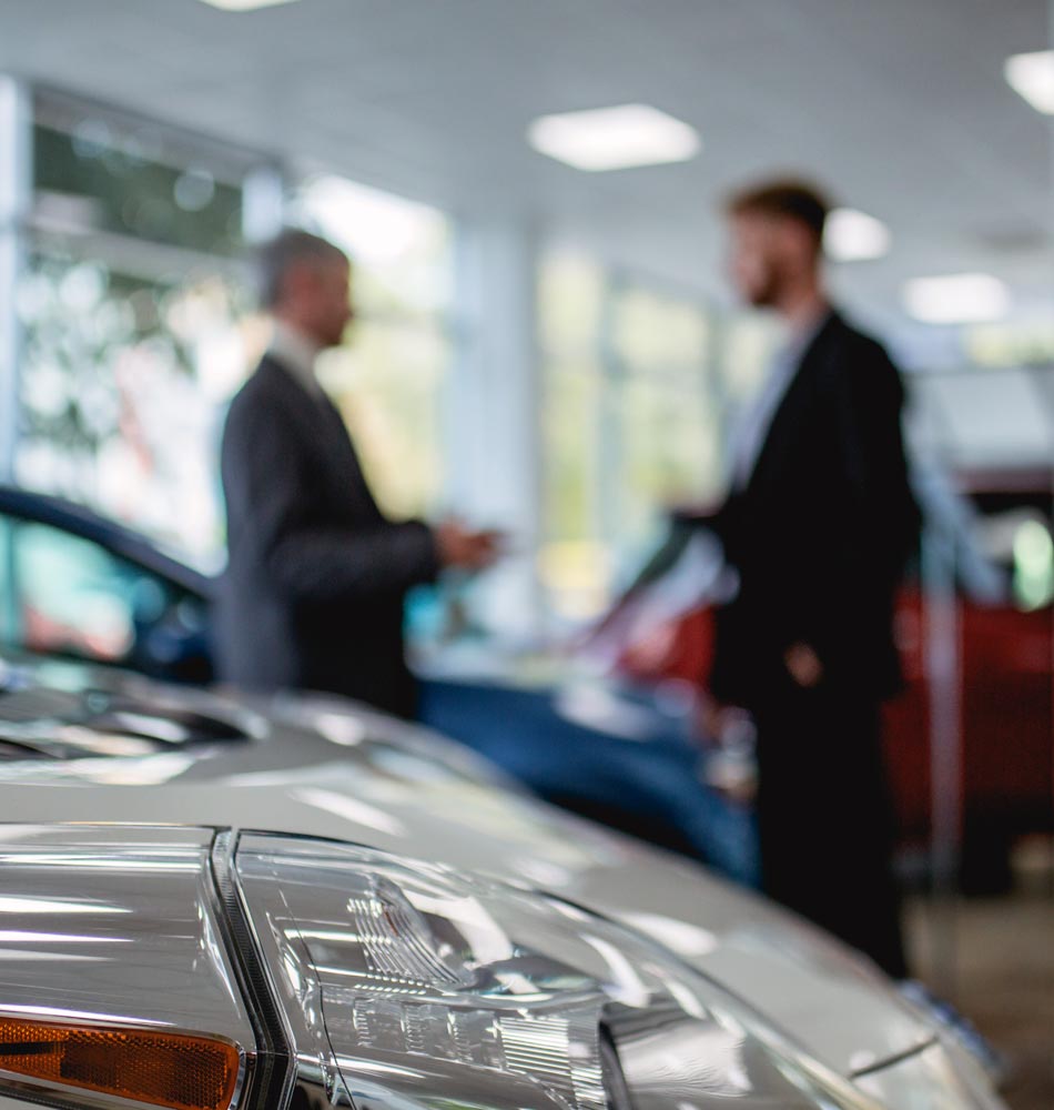 Customers talking to staff in a showroom